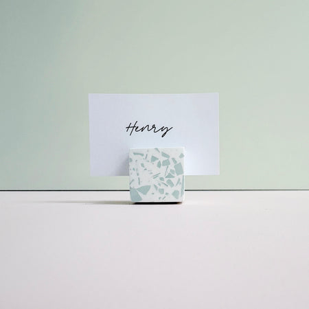 sage green terrazzo event name card holder. photo holder