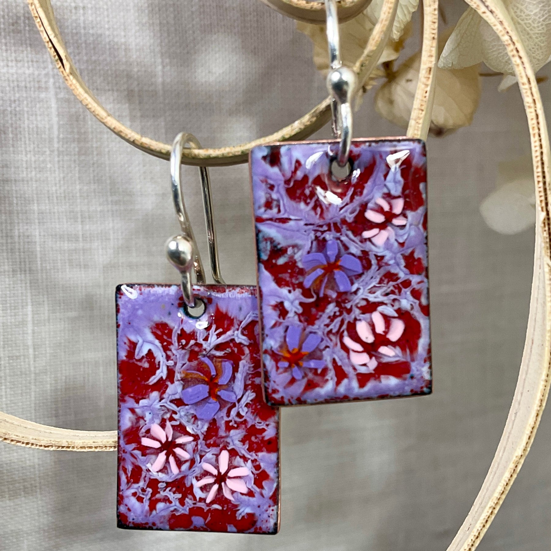 Purple and pink flowers. Enamel earrings
