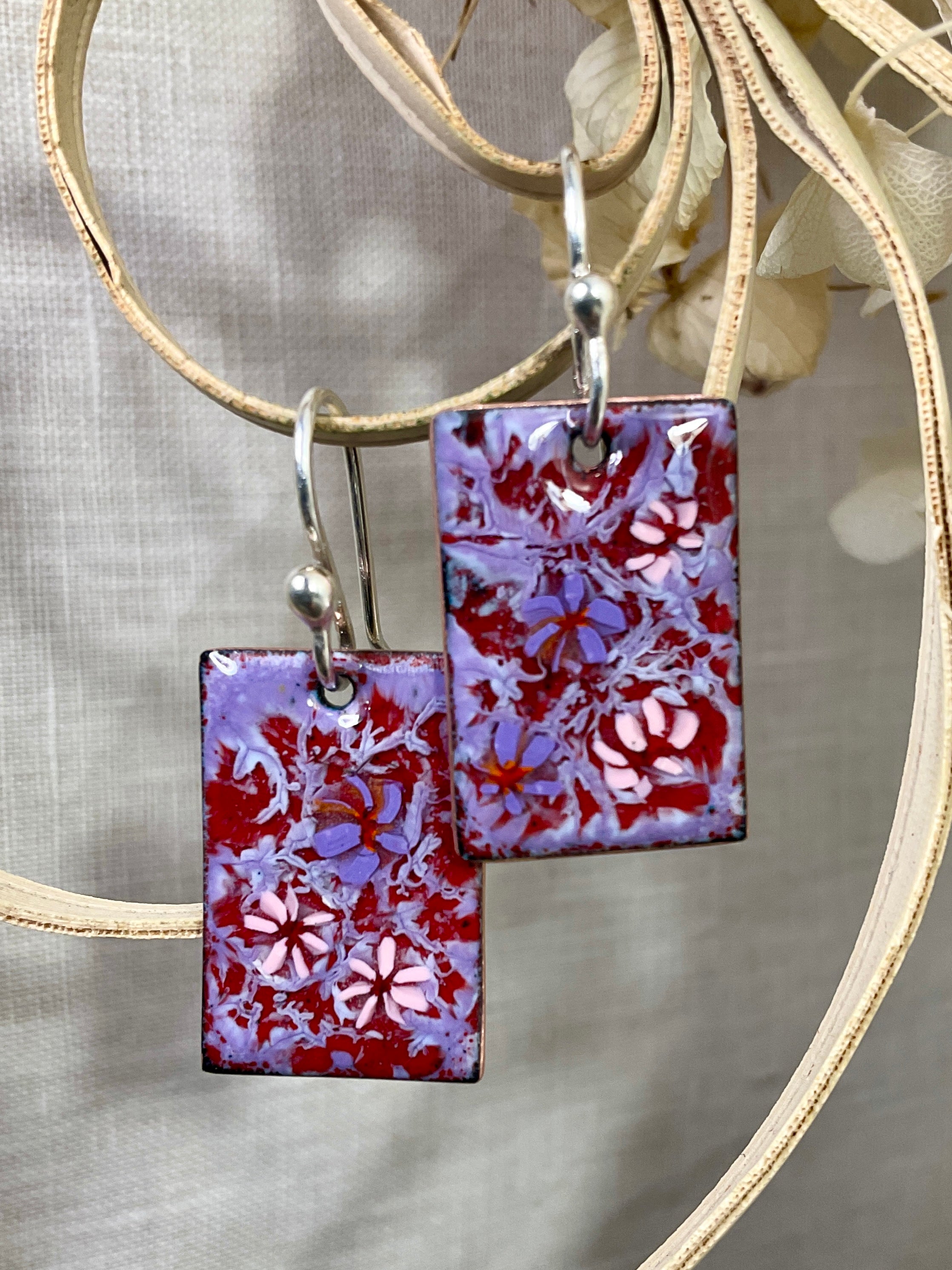 Purple and pink flowers. Enamel earrings