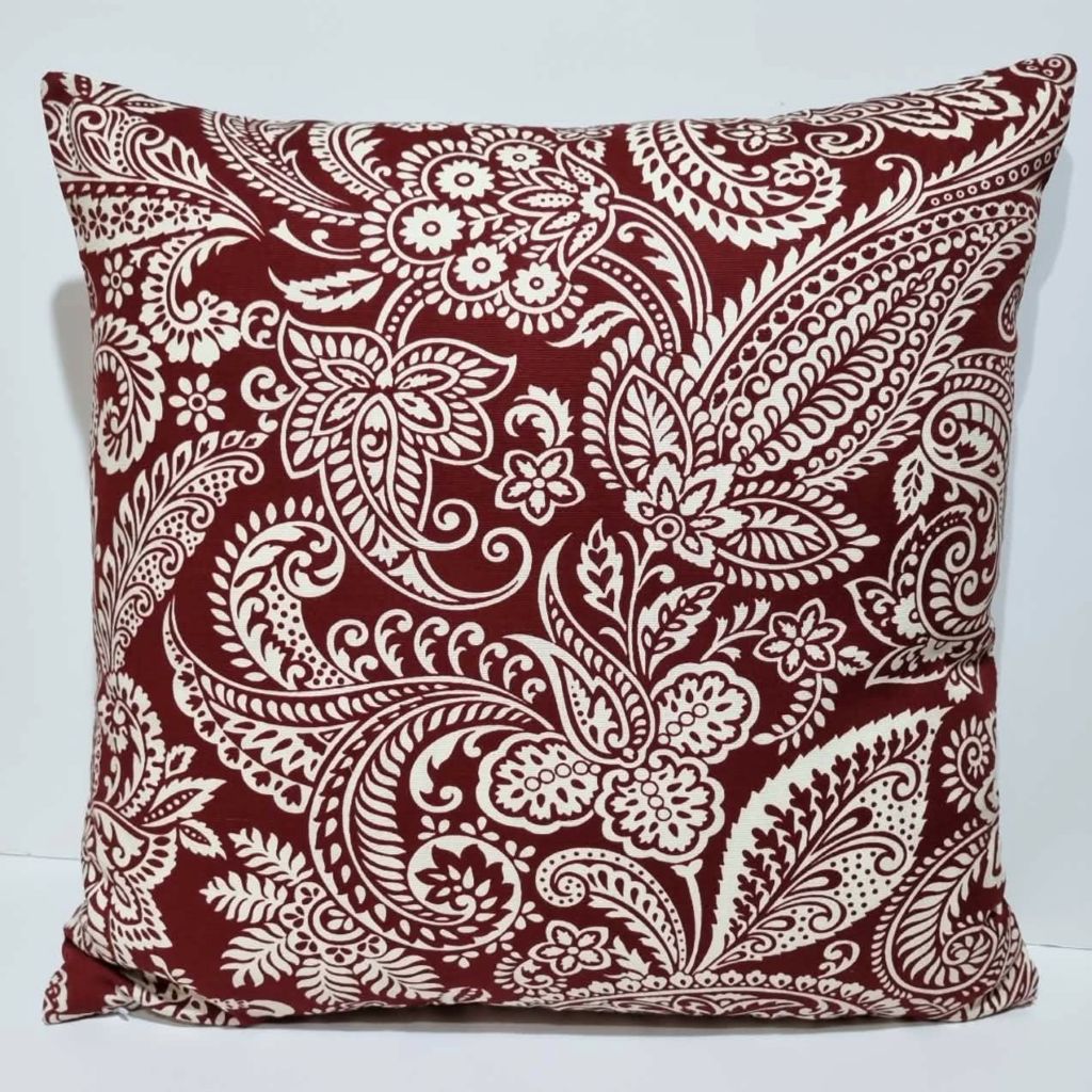 Retro-style red paisley cushion cover –  mid-century modern space.