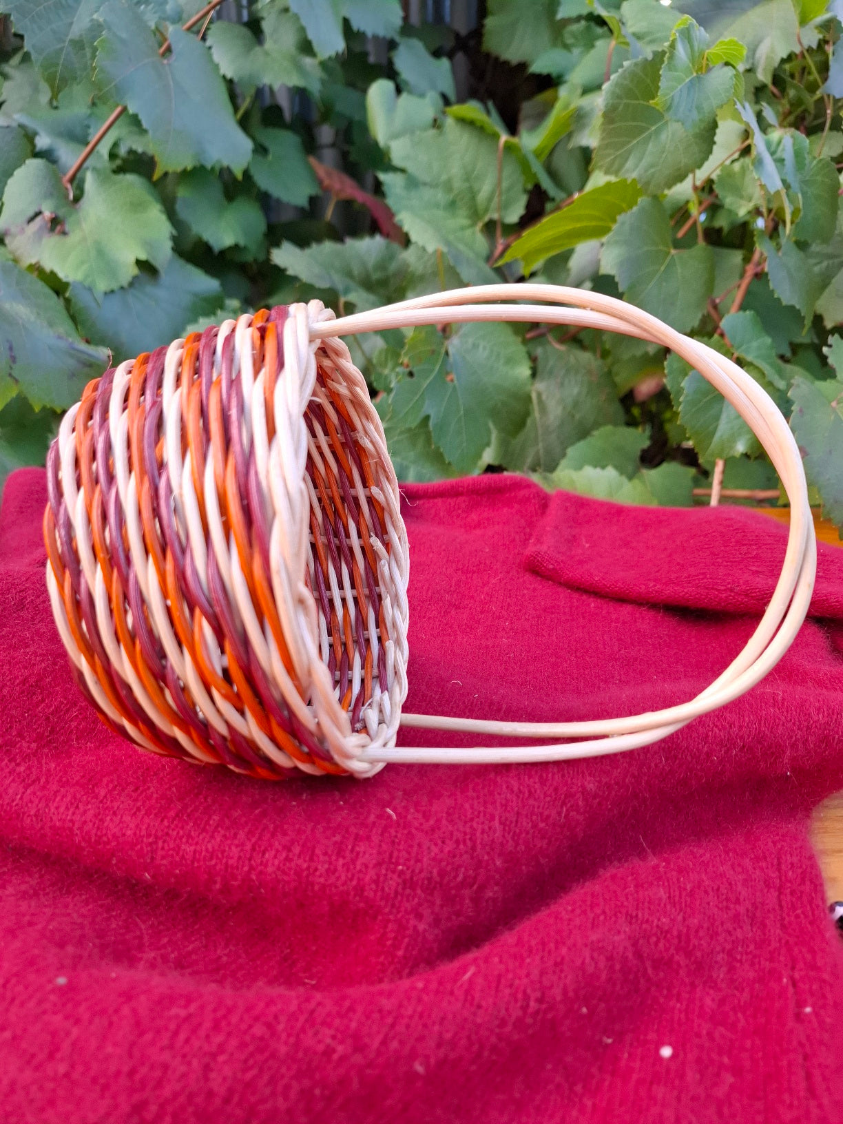small orange brown handled basket