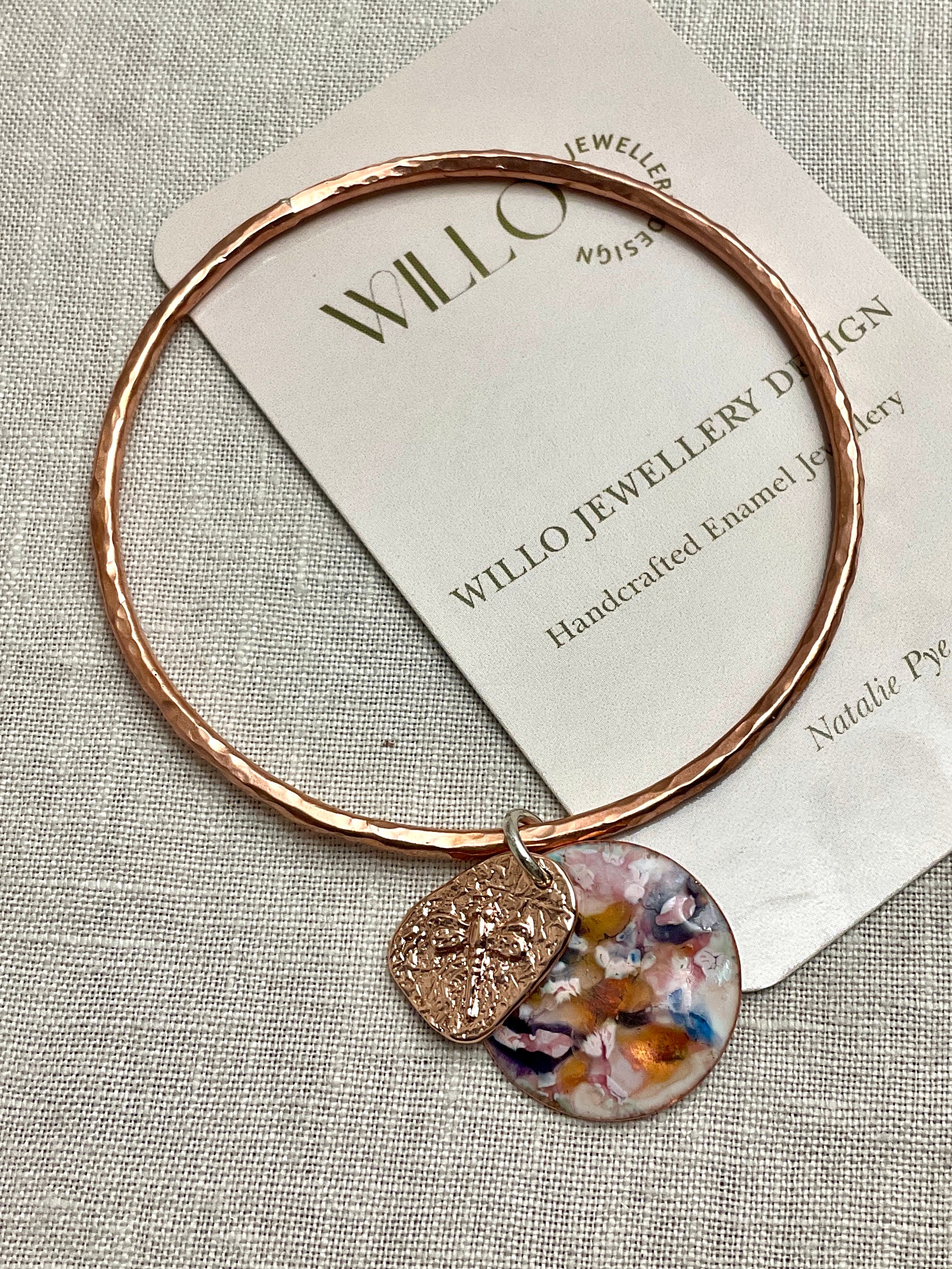 Bangle. Hammered texture. With enamel charm. Two styles