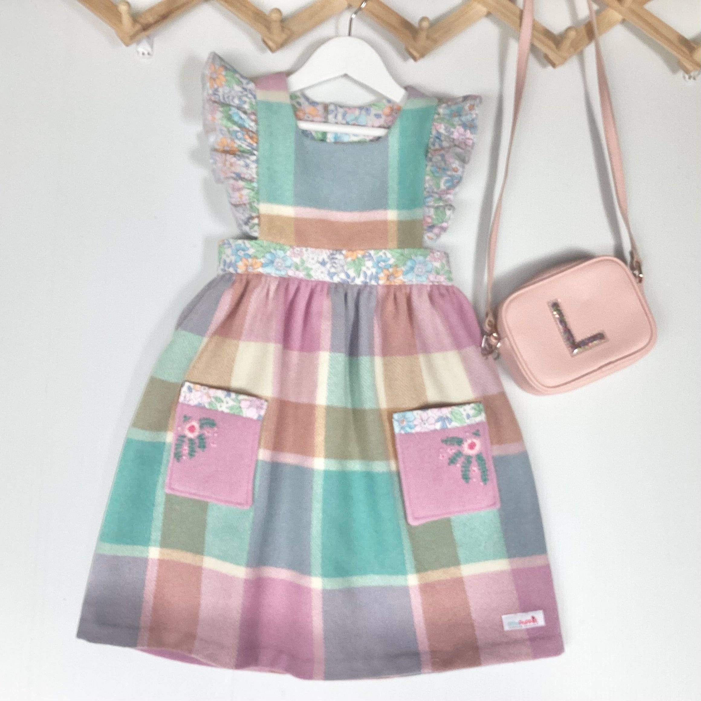 Girl's Upcycled Blanket Pinafore with Sleeve Ruffles and Hand Embroidery