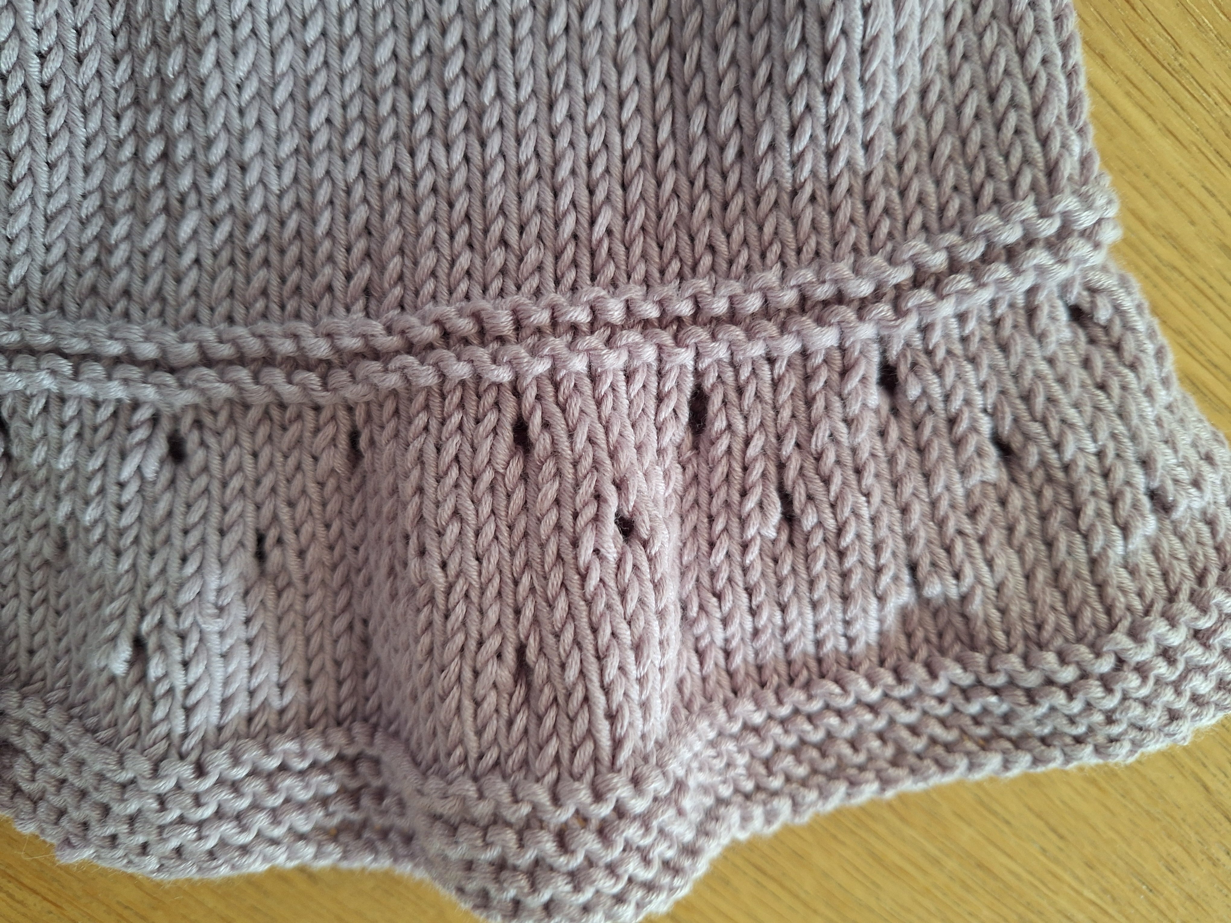 Handknitted Baby Cardigan in 100% natural Lilac yarn
