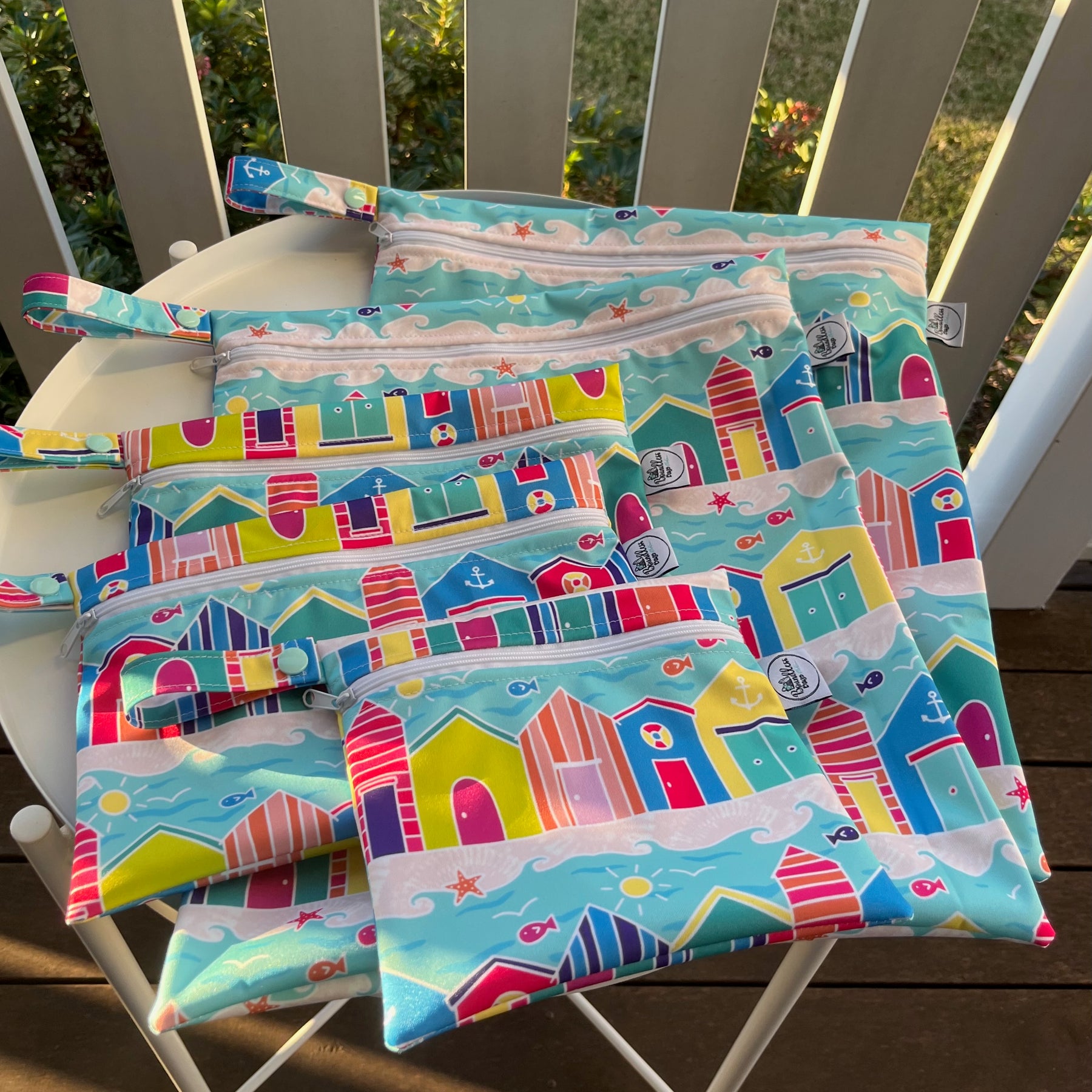 PRE-ORDER Water-resistant wet bags - Colourful Beach Huts (Ladybird and Roar)