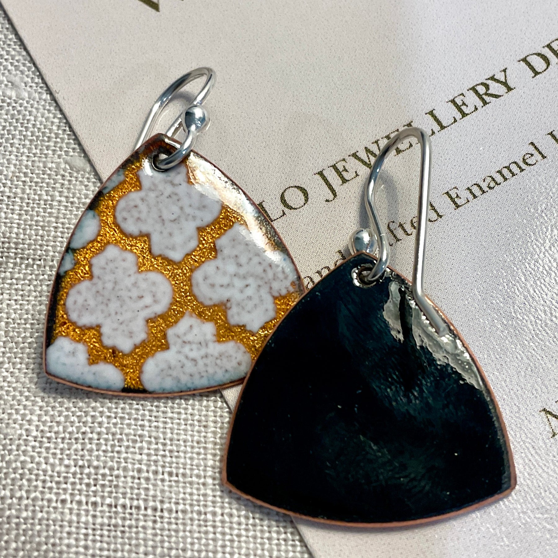 Golden and white pattern earrings. Enamel. Handmade