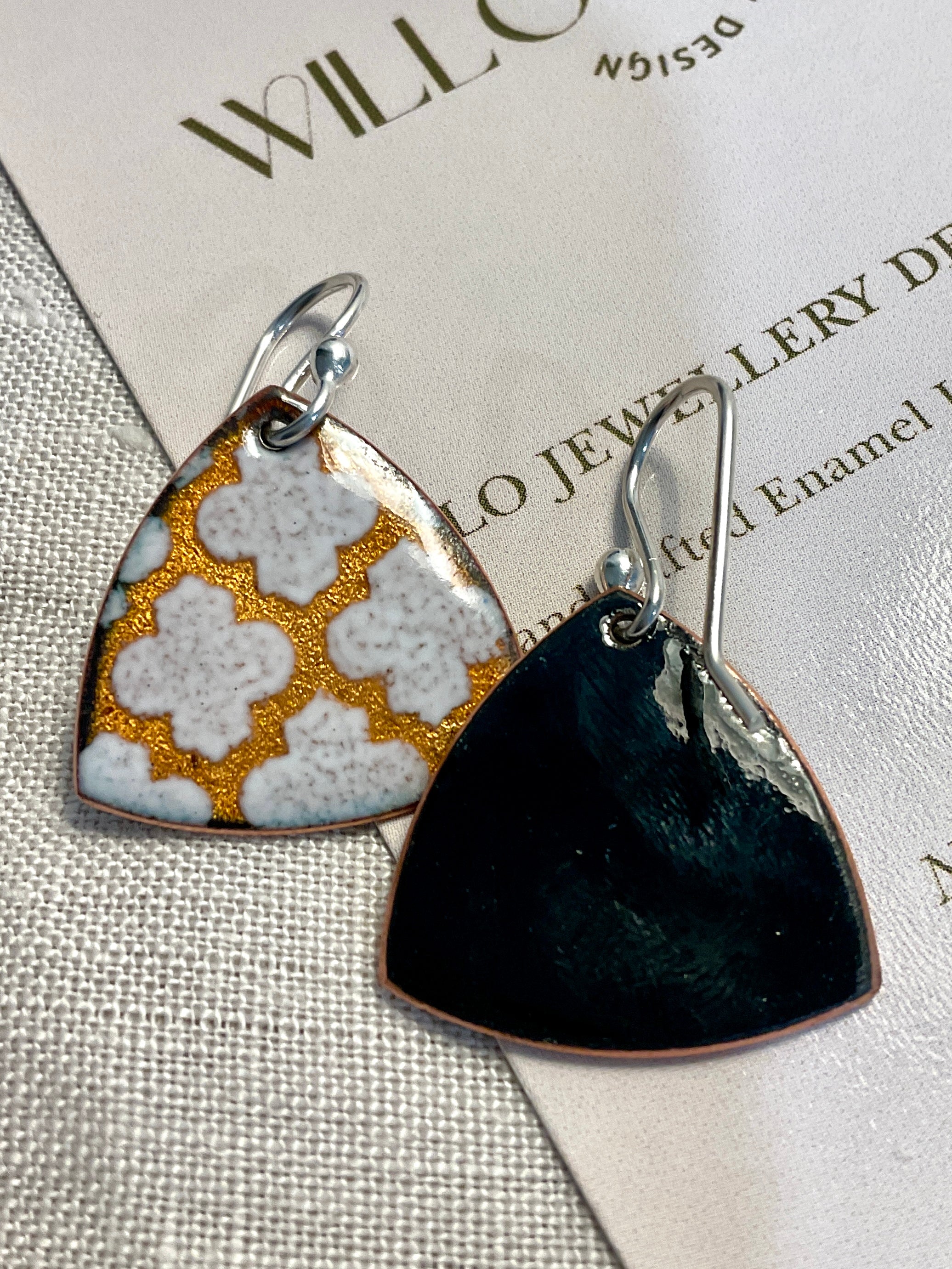 Golden and white pattern earrings. Enamel. Handmade