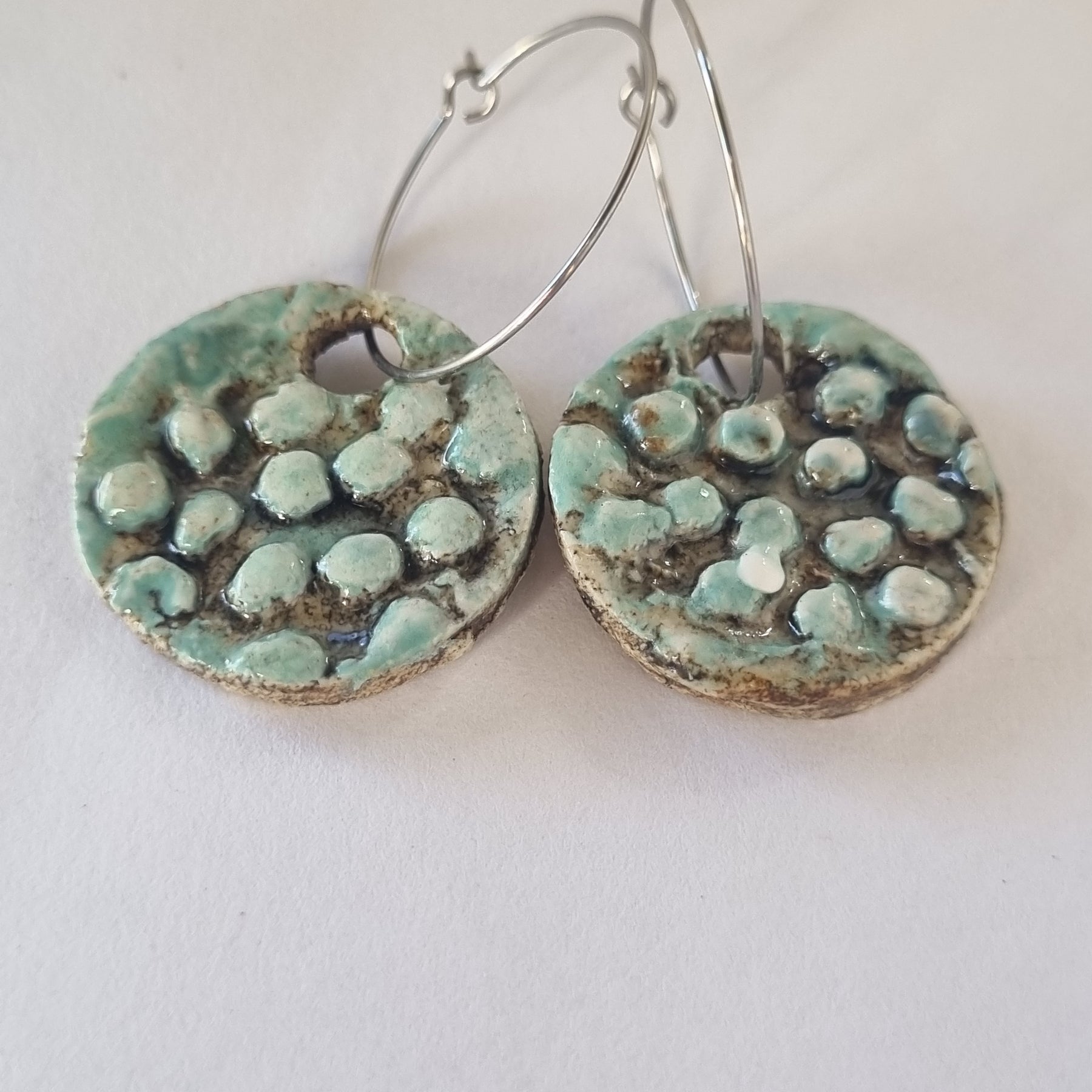Handmade Stoneware Ceramic Earrings, blue-green black multi-coloured, 28mm diameter, pierced ears