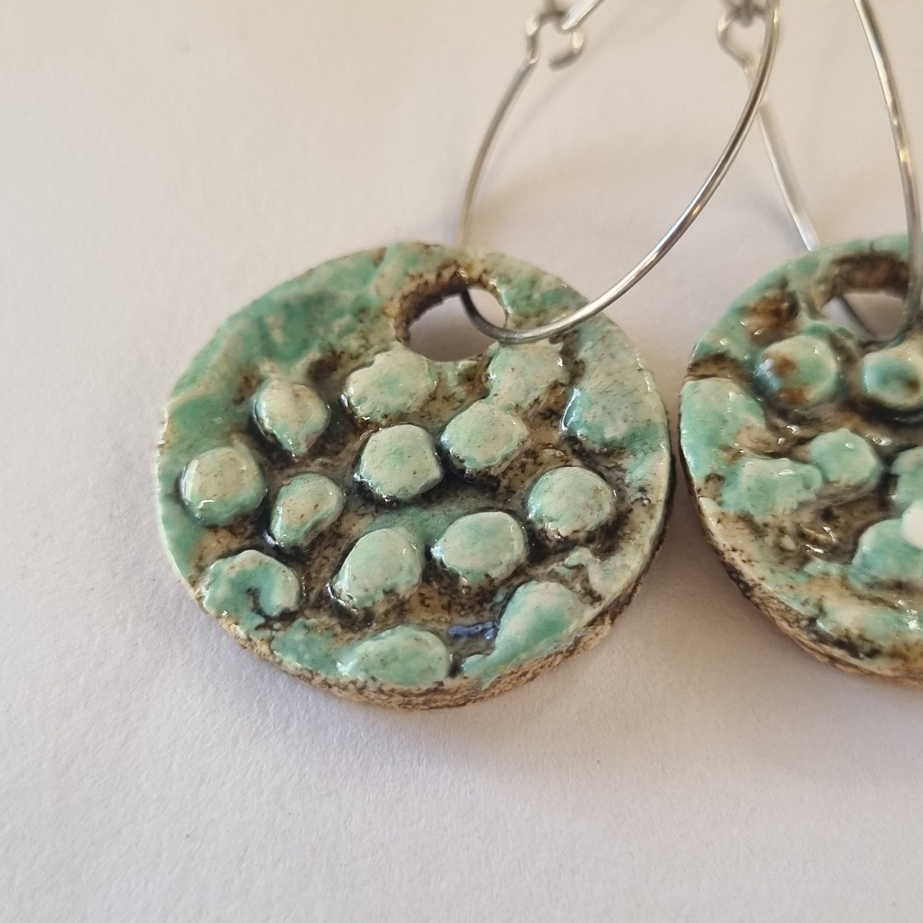 Handmade Stoneware Ceramic Earrings, blue-green black multi-coloured, 28mm diameter, pierced ears