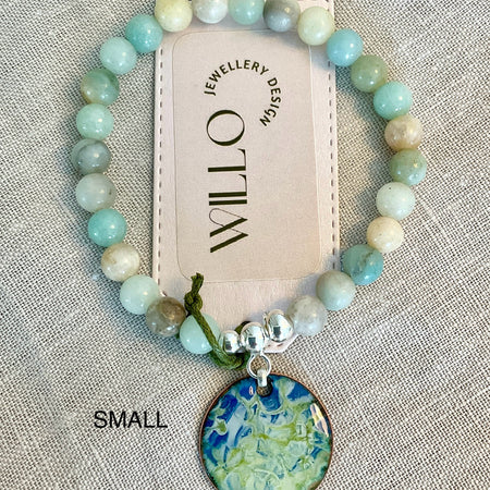Amazonite gemstone bracelet with enamel charm.