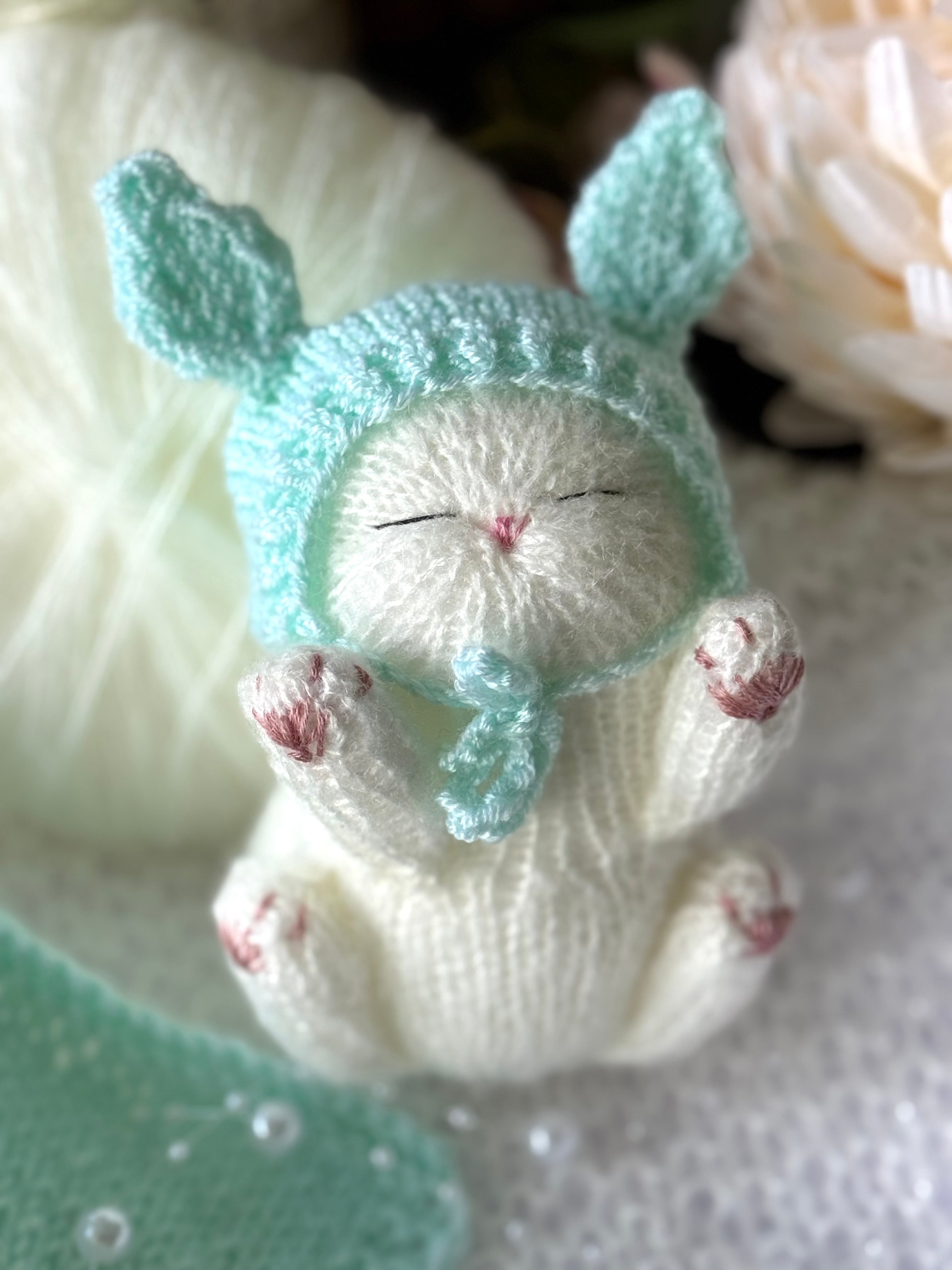 Handmade White Knitted Sleeping Kitty Toy in The Bunny Hat and Blanket