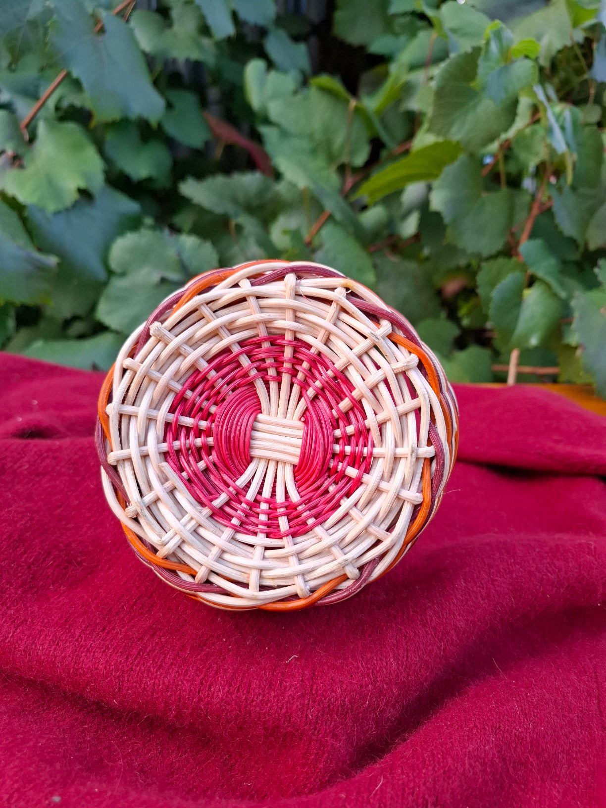 small orange brown handled basket