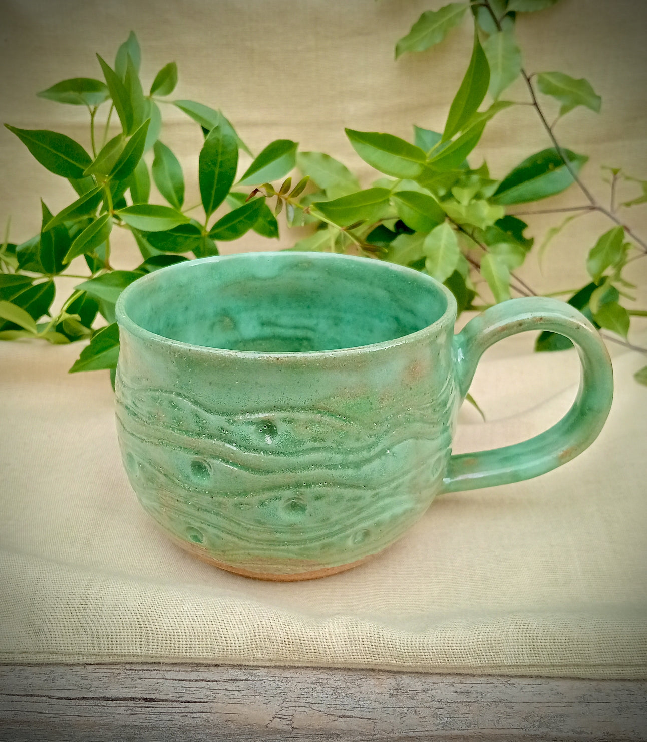 Light jade green hand made mug
