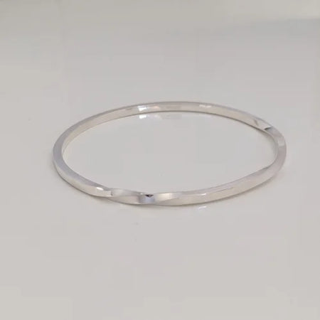 handmade polished twisted bangle