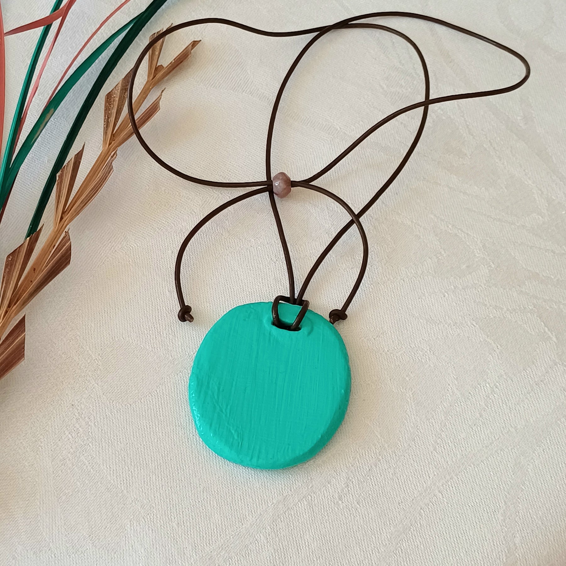 Nordic Flower pendant, natural clay, adjustable leather cord