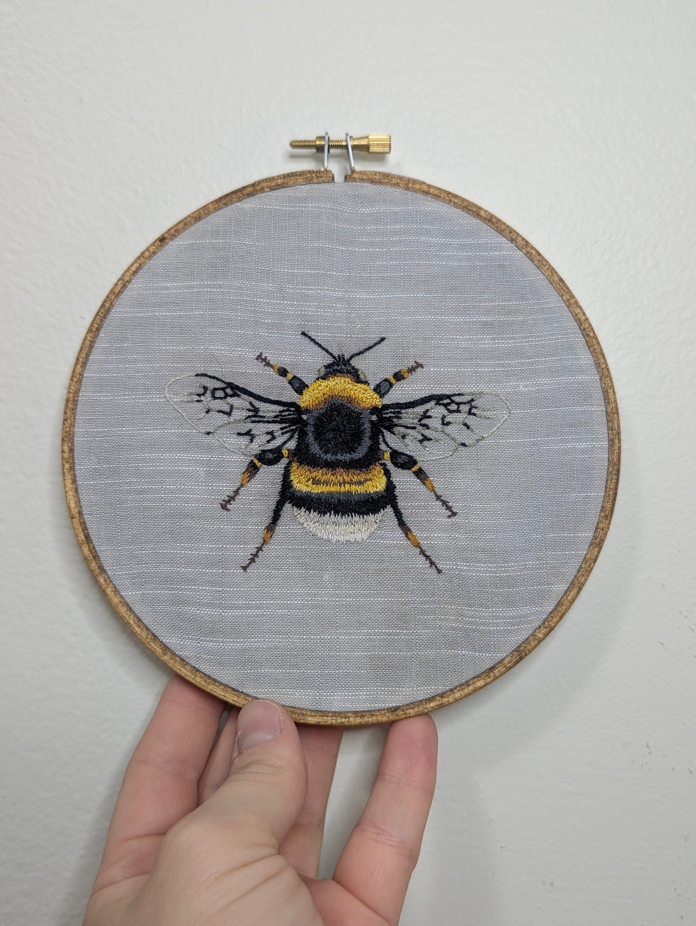Bee embroidery framed in 6" wooden hoop
