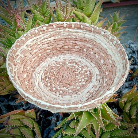 Woven hand dyed raffia basket
