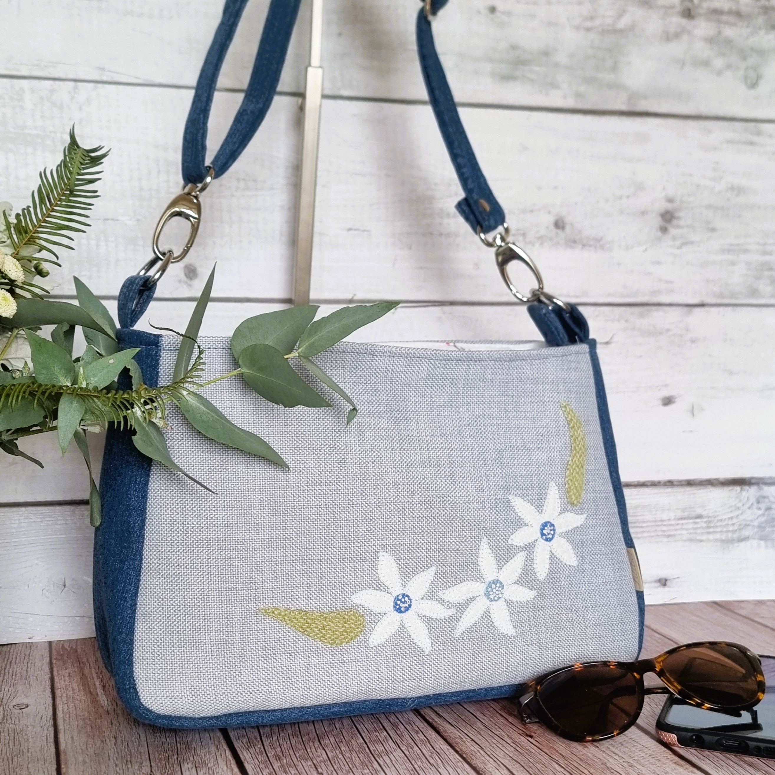 Handmade appliqued crossbody zip bag - blue with flannel flowers