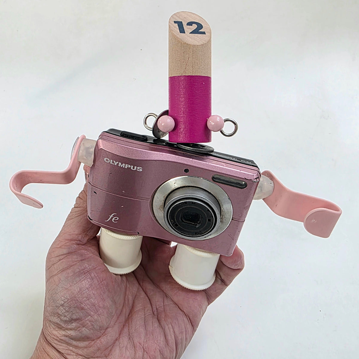 Remade, Reimagined: Pinky Olympus-FE Camera Bot