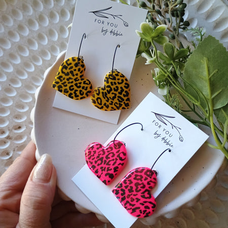 Heart dangle earrings- bright leopard hoops