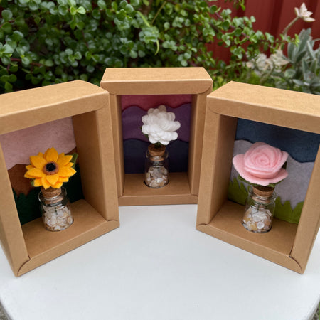 Minature flower in glass jar