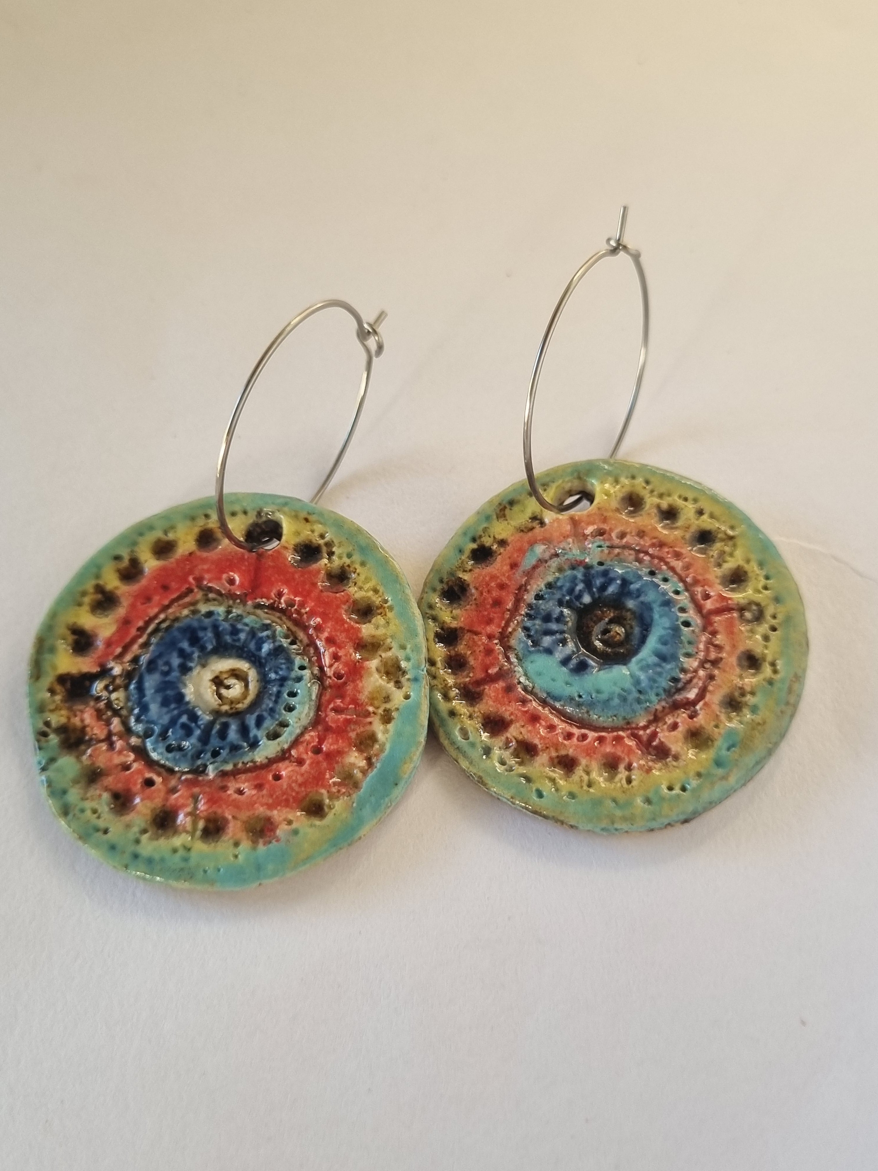 Handmade Stoneware Ceramic Earrings, blue-orange-green multi-coloured, 35mm diameter, pierced ears
