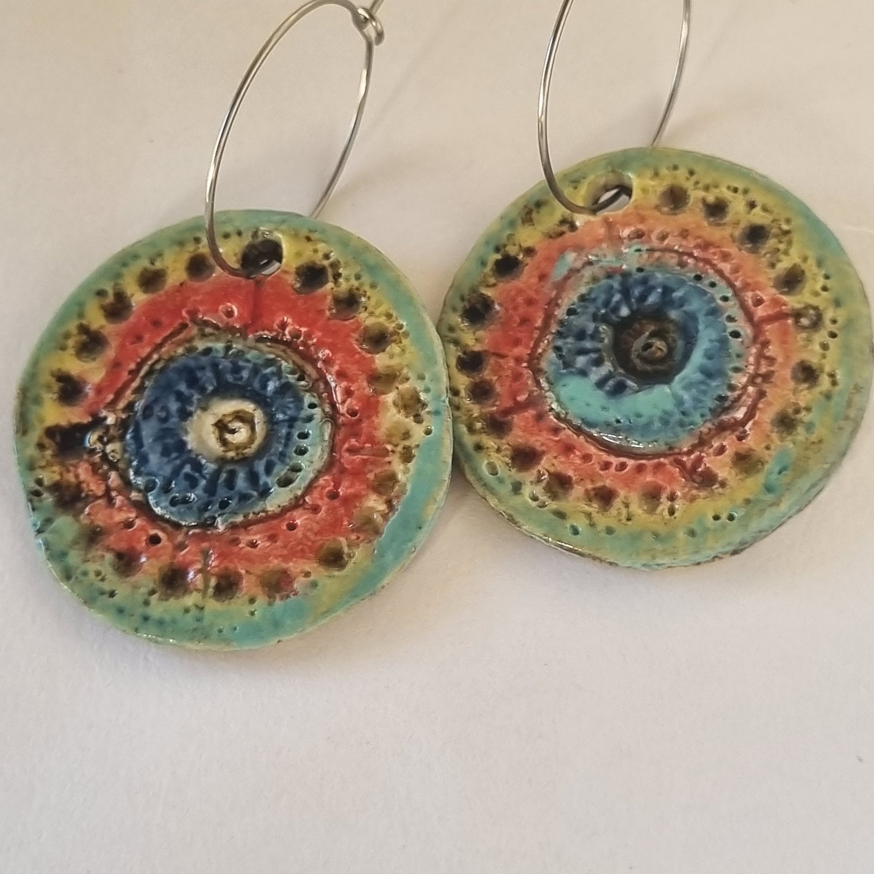 Handmade Stoneware Ceramic Earrings, blue-orange-green multi-coloured, 35mm diameter, pierced ears