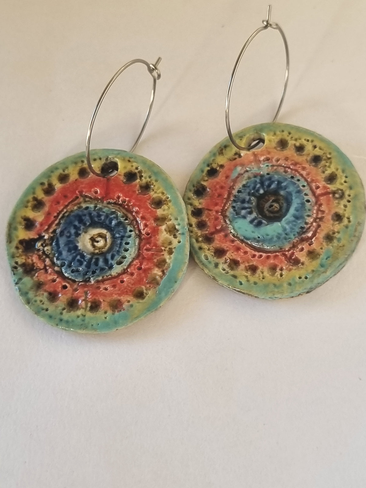 Handmade Stoneware Ceramic Earrings, blue-orange-green multi-coloured, 35mm diameter, pierced ears