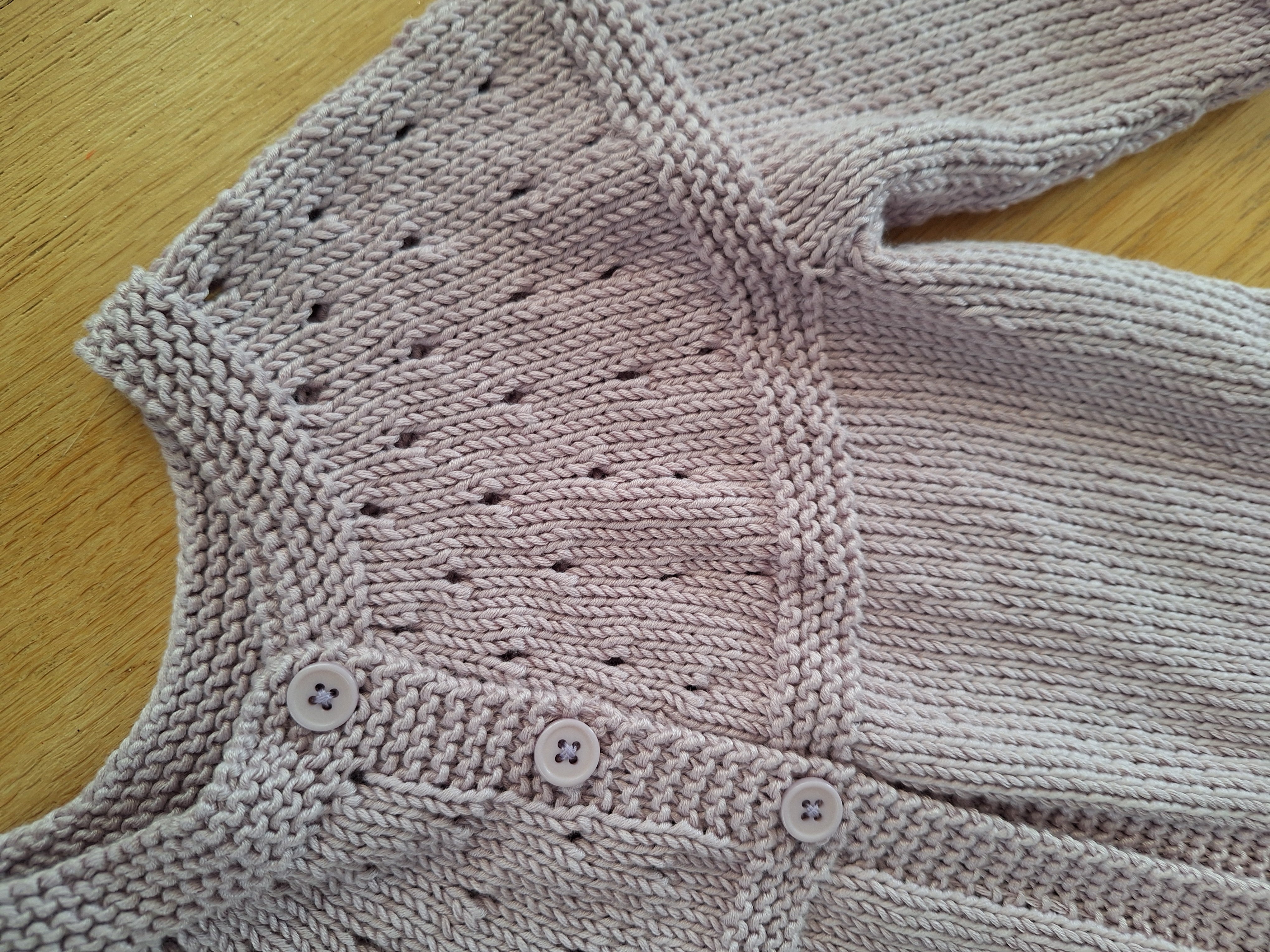 Handknitted Baby Cardigan in 100% natural Lilac yarn