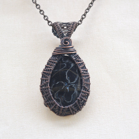 Roots of Age – Handcrafted Palm Root Fossil Copper Pendant