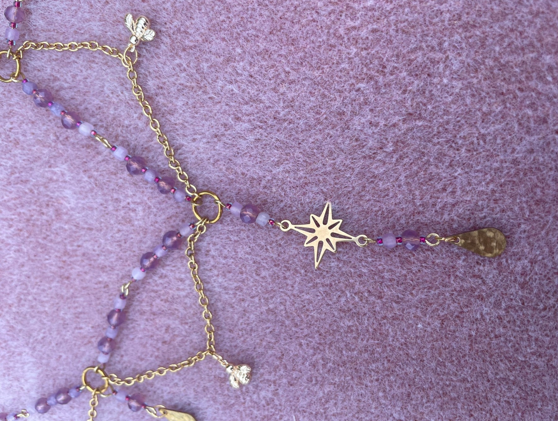 Pink and gold beaded bee charm necklace
