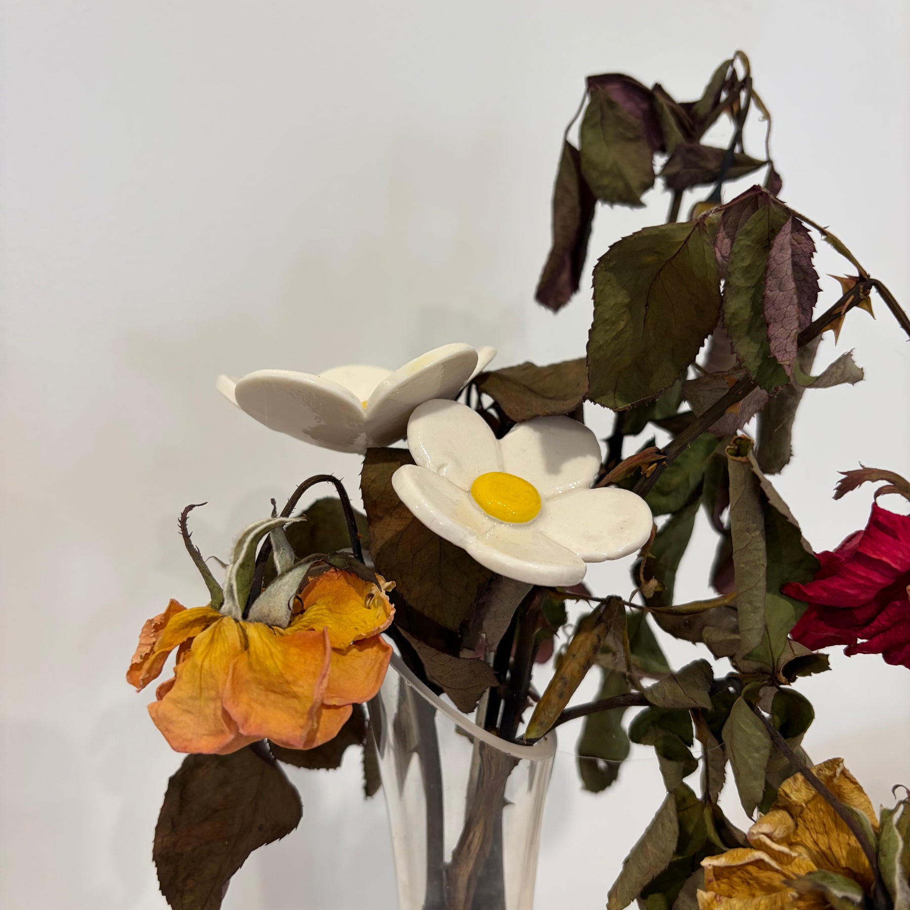 Ceramic flowers - pink, white and blue by the stem!