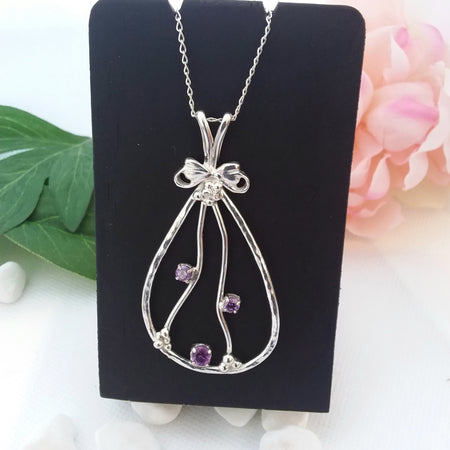 Sterling silver pendant with amethyst cubic zirconia