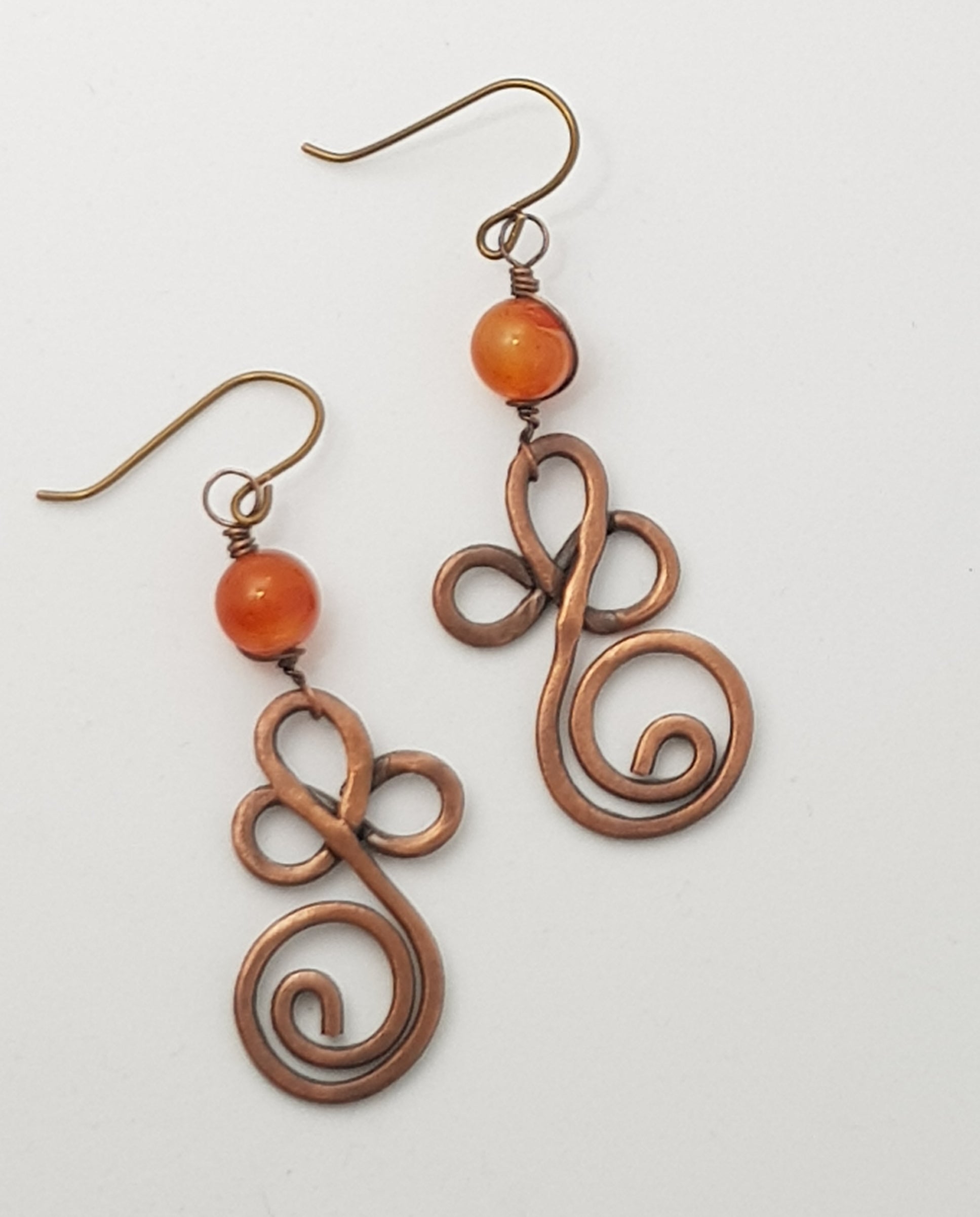 Copper swirl earrings with Carnelian bead #654 AM/E