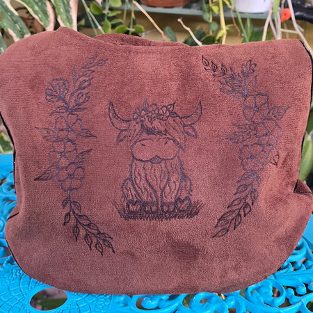 Handburnt highland cow shoulder bag
