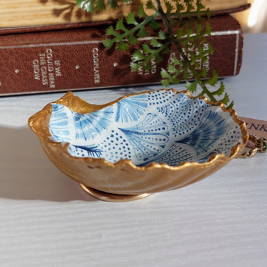 Shell dish decoupaged in blue scallop fan design