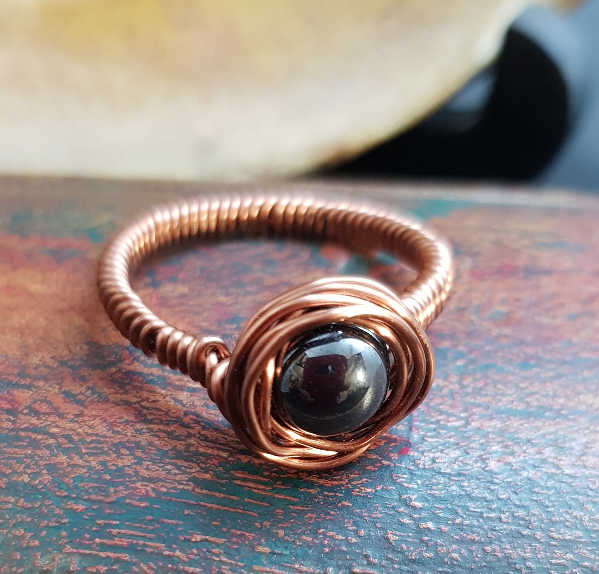 Crazy wrapped ring, in copper and hematite stone (303 AM/R)