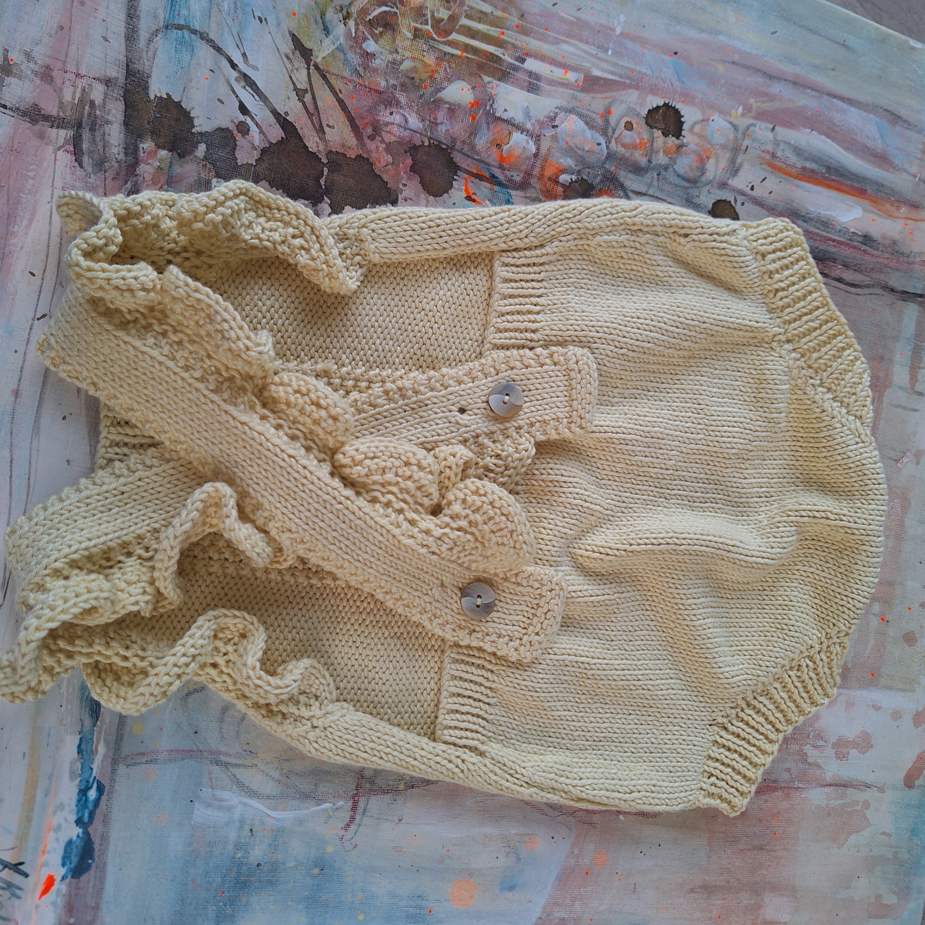 Handknitted Baby Romper Sz 6mths Sweet frills.