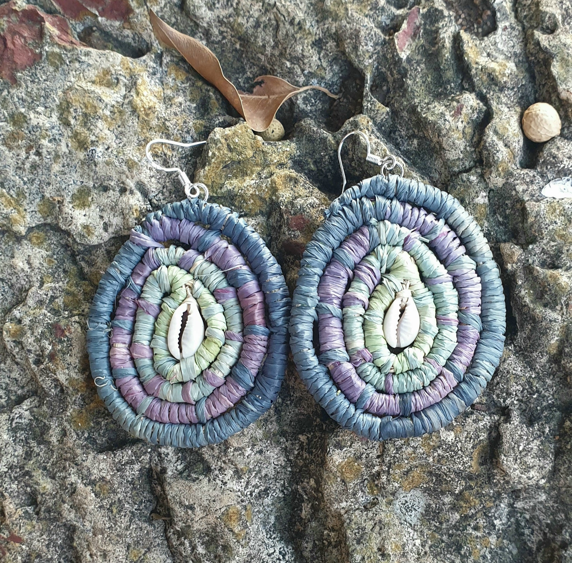 Handmade raffia, cowrie shell earrings.
