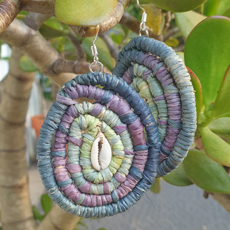 Handmade raffia, cowrie shell earrings.