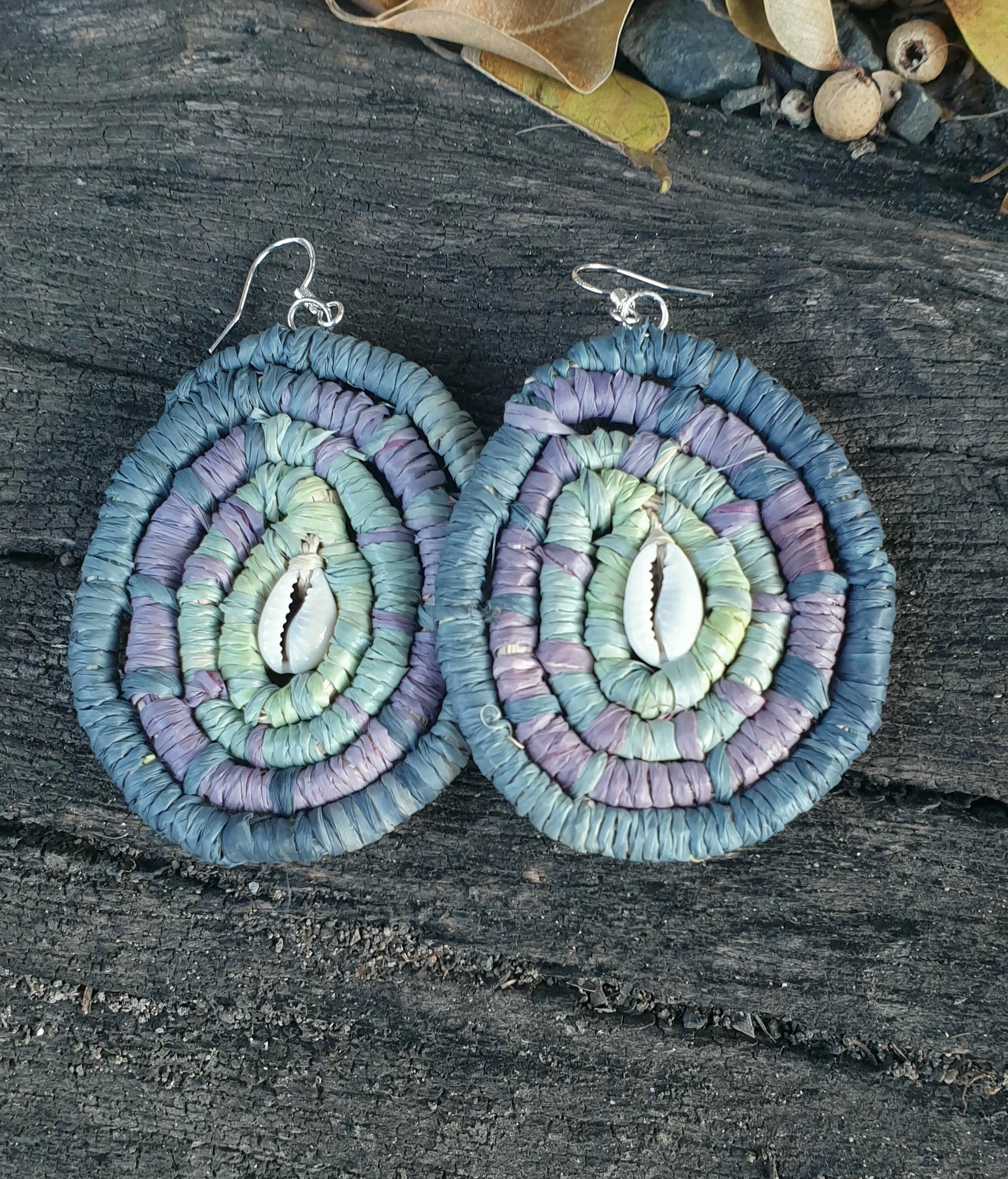 Handmade raffia, cowrie shell earrings.