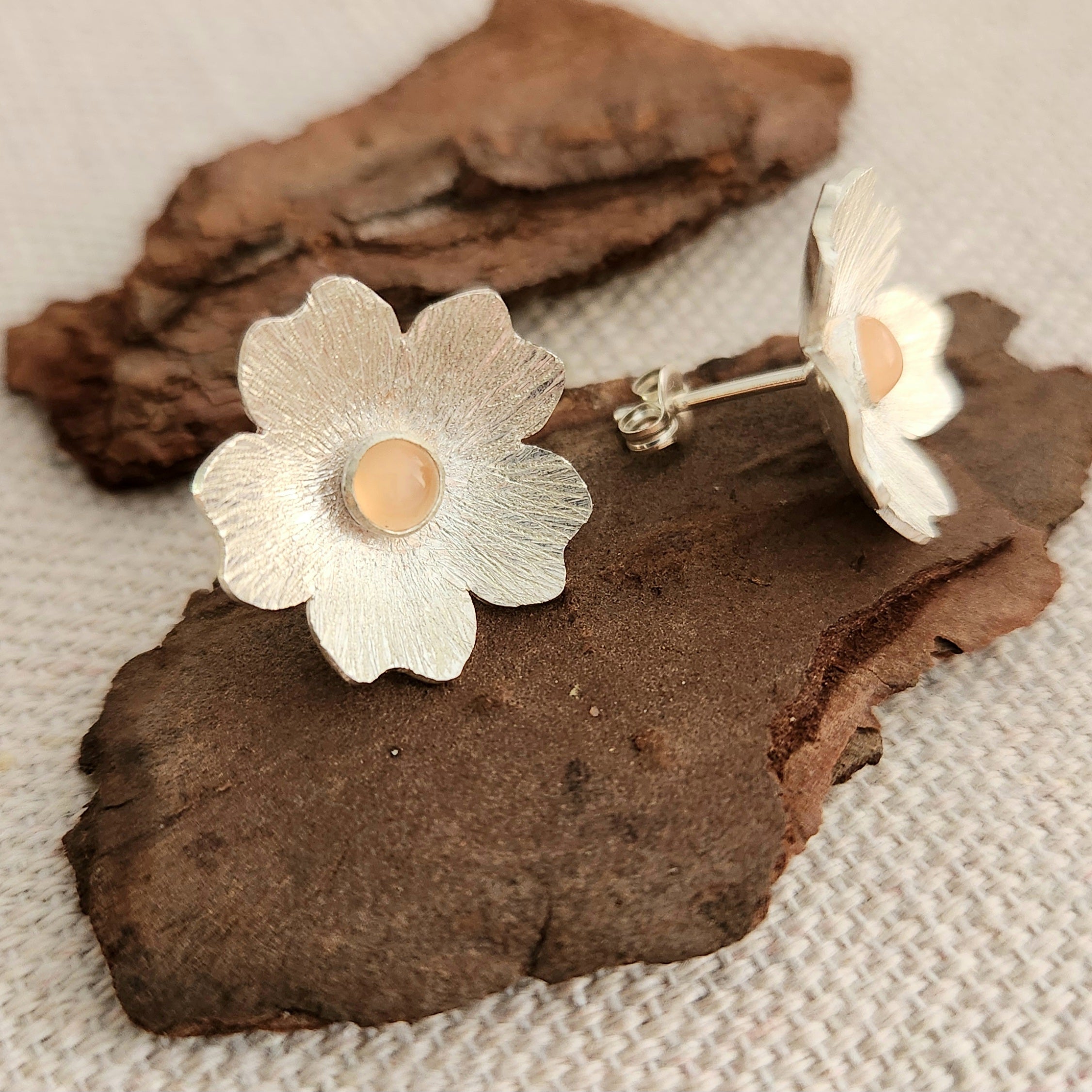 Silver flower studs