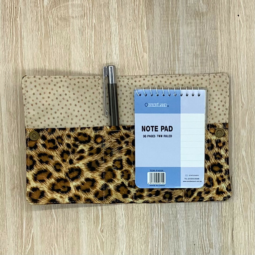 Leopard Spot refillable fabric pocket notepad cover with snap closure. Incl. book and pen.