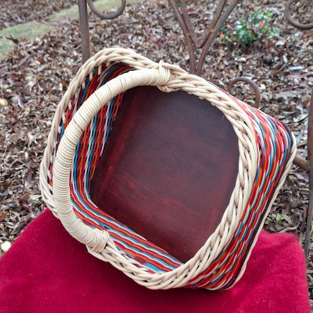 Large Rectangular basket brown, orange, blue and natural wicker.
