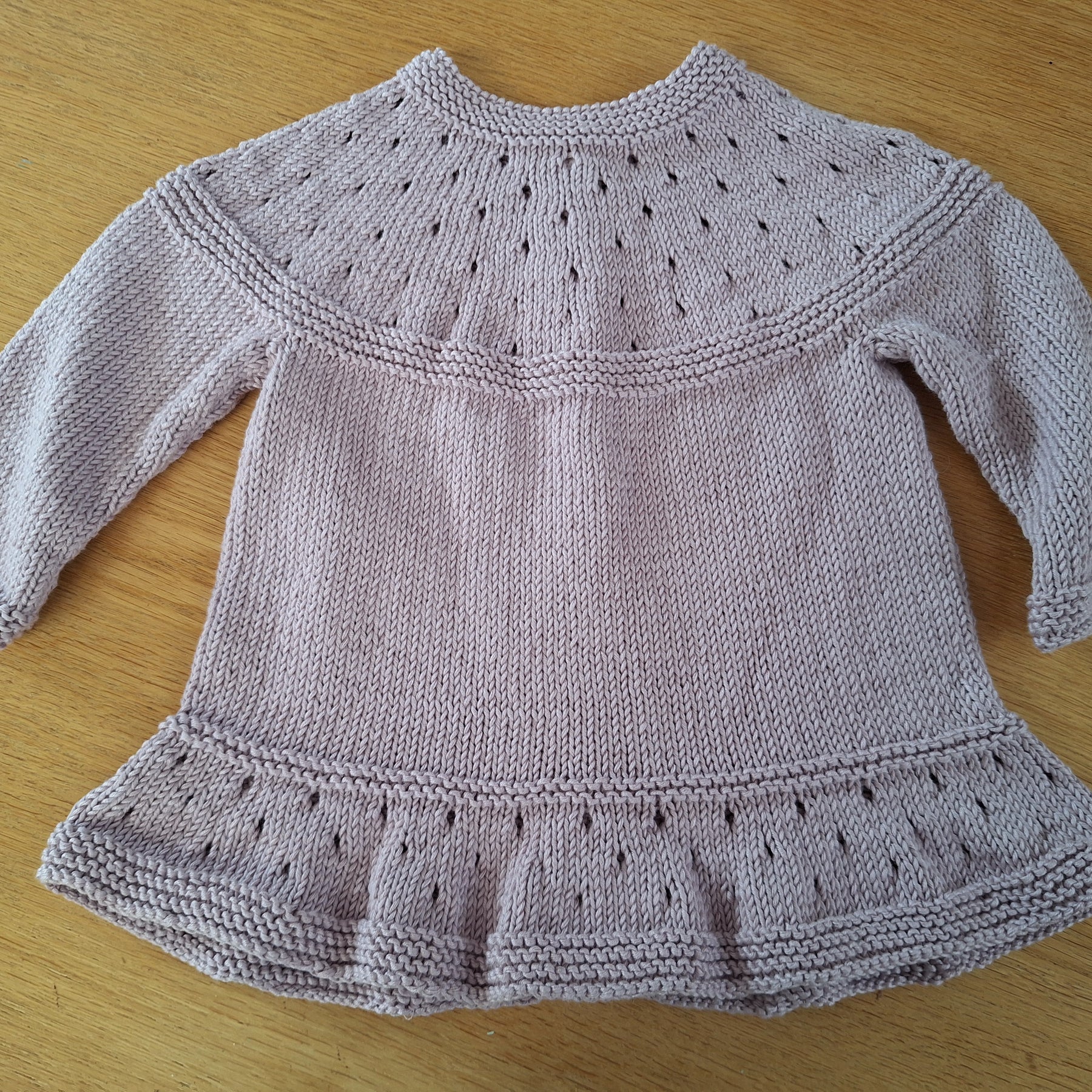 Handknitted Baby Cardigan in 100% natural Lilac yarn