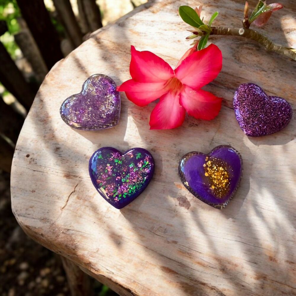 Set of four purple magnets