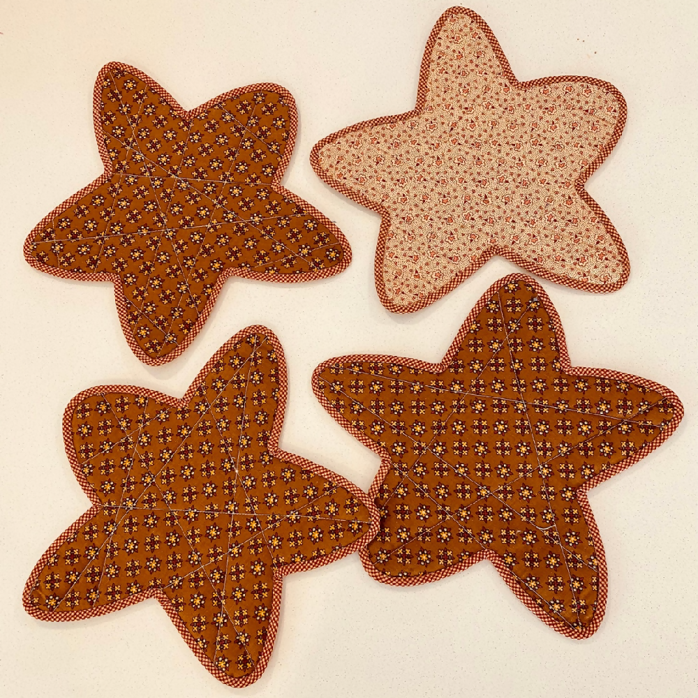 Set of 4 star shaped placemats