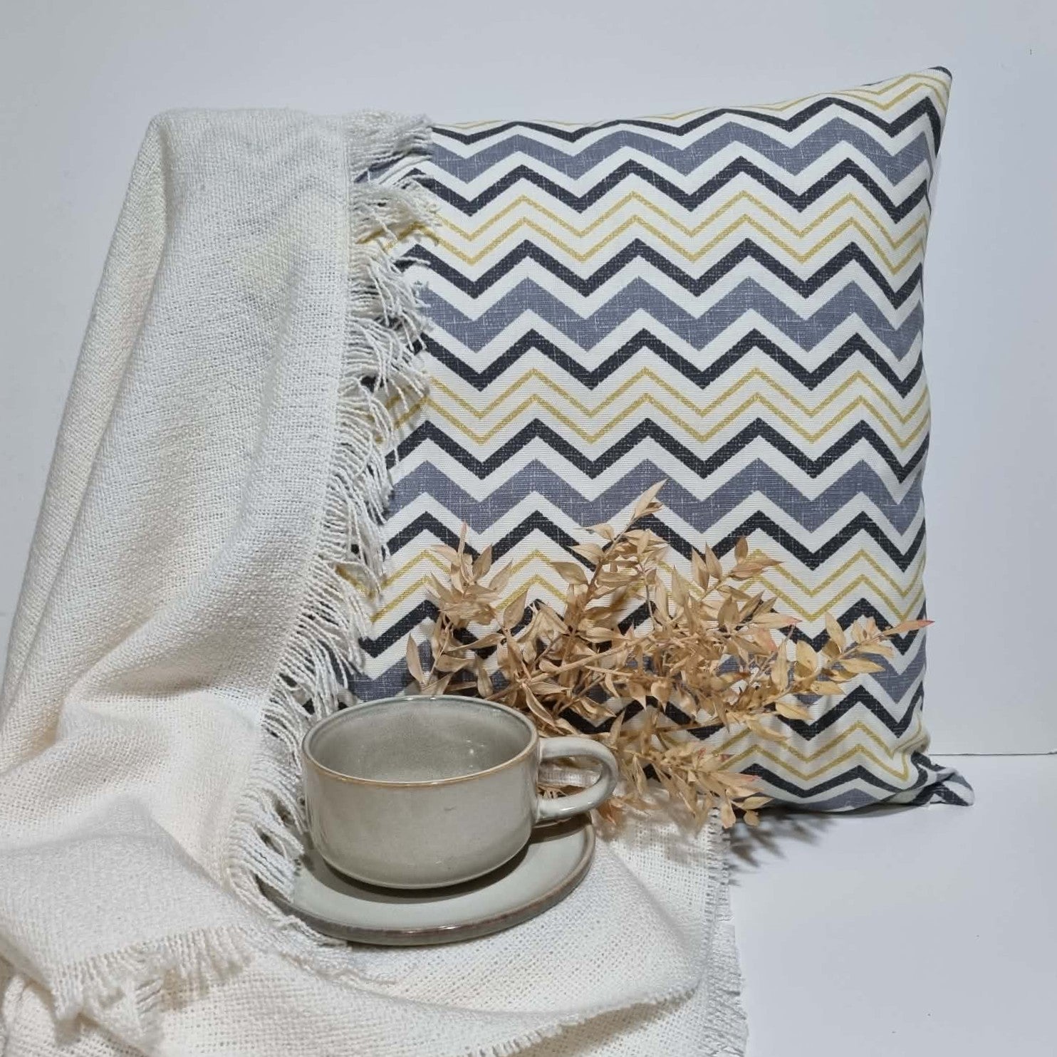 Geometric grey and yellow cushion cover. Modern living