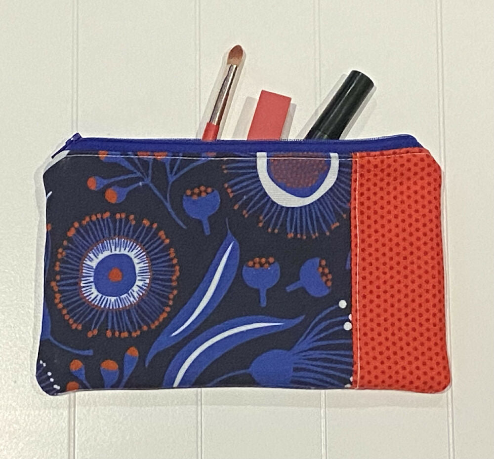 Red and blue gum blossom purse