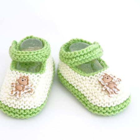 Knit cream and green baby booties with monkeys size 0-3 months